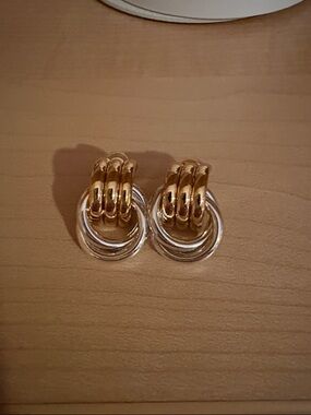 Heaven Mayhem two toned baby knot earrings